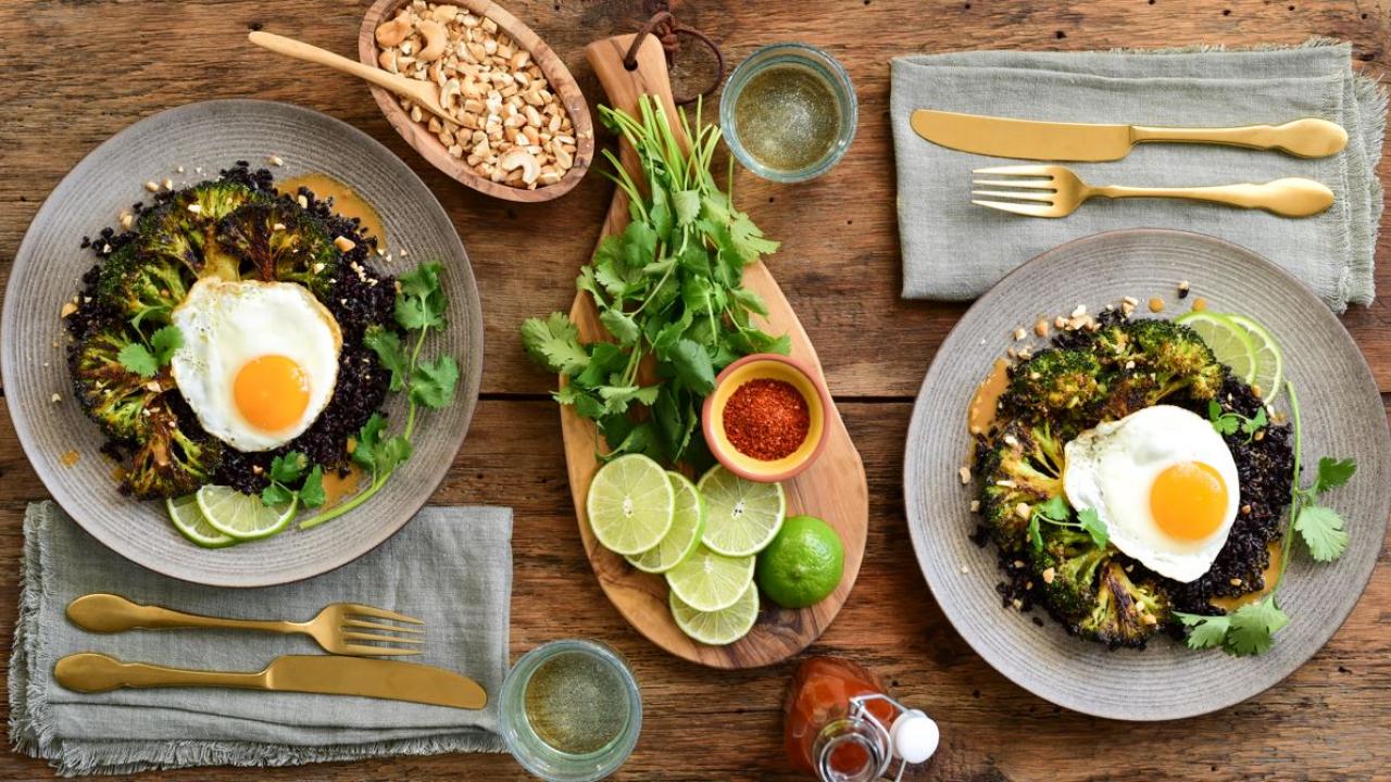 Stir-Fried Black Rice with Fried Eggs And Parmesan Roasted Broccoli image